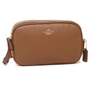 Coach pebble crossbody clutch.  Like new.